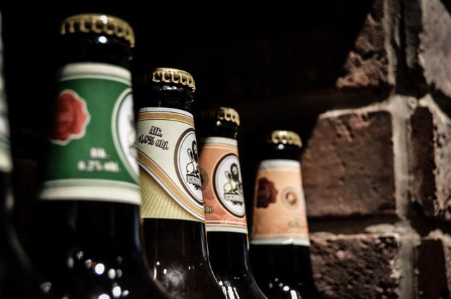 picture showing the top of a couple of beerbottles